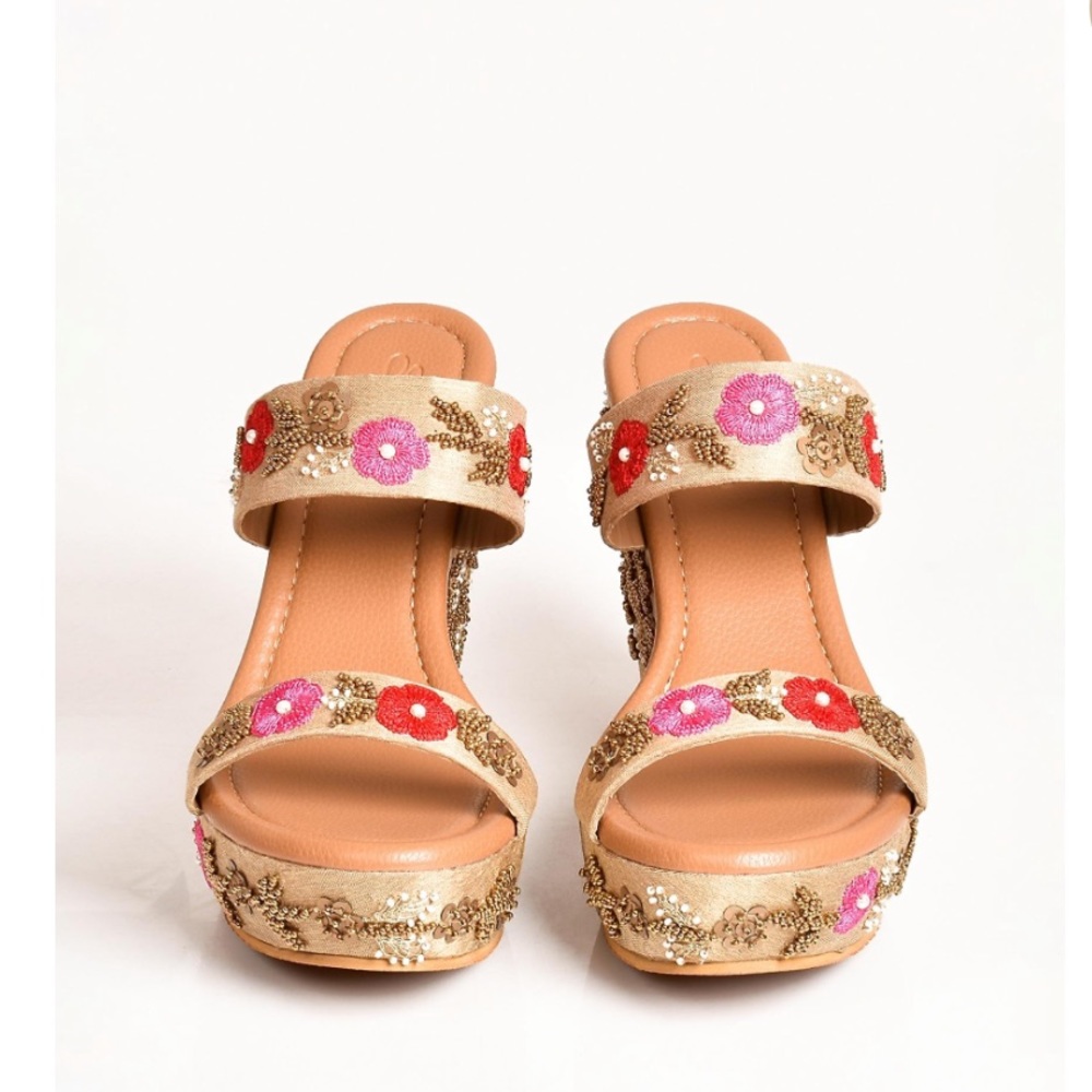 Nude wedges in silk with red and pink resham flowers along with gold sequin work
